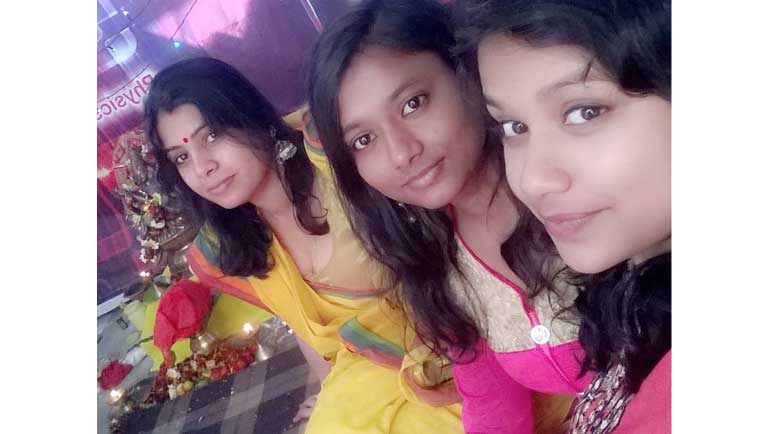 Students take selfie at the Puja Place