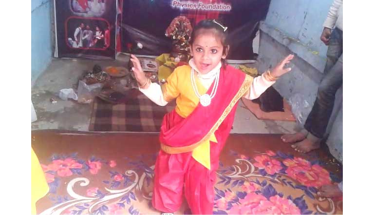 A kid 'Aru' permorms dance during celebration