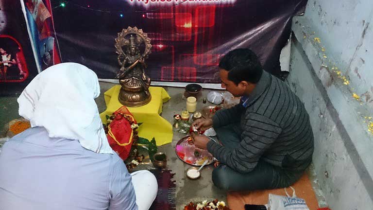 Puja Begins. Vishal performing rituals with the Priest